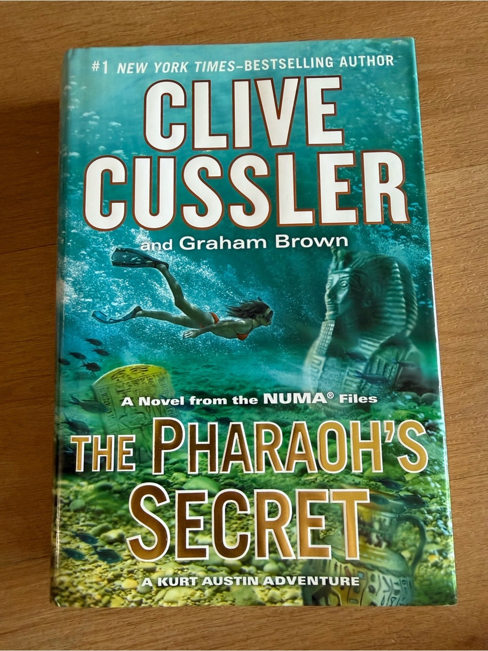 📚3 for $12📚Clive Cussler "The Pharaoh's Secret" Hardcover - Teal & Green Cover